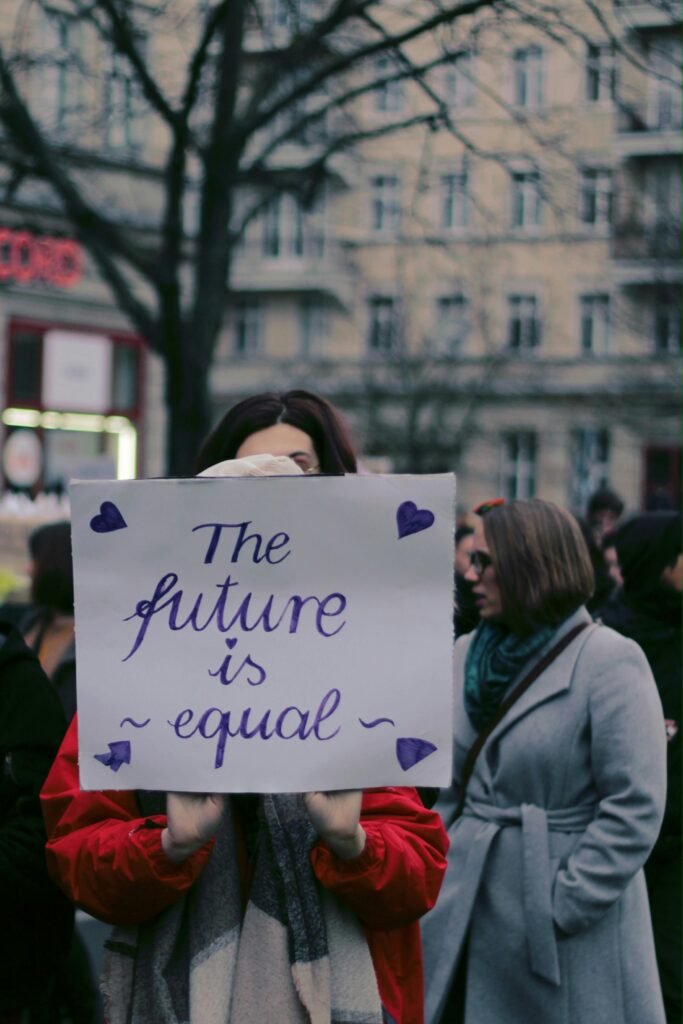 A peaceful protest in Berlin advocating for equality with signs and placards.